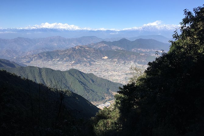 Chandragiri to Taudaha Nature Day Hiking from Kathmandu - Descending through forest toward Taudaha Lake