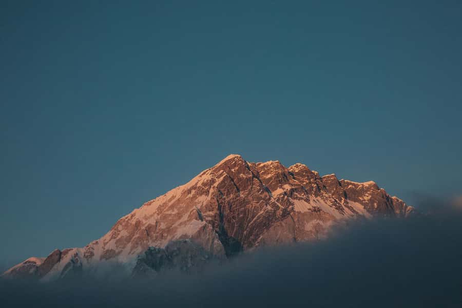 Machhapuchhre catching the first light above the Annapurna foothills