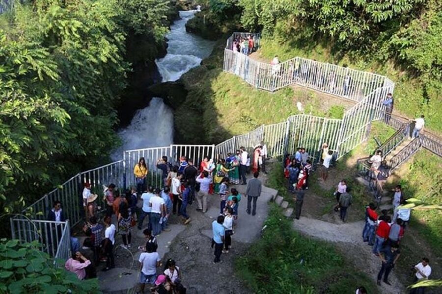 From Pokhara: Guided Day Jungle Hiking Tour with Boat Ride - Davis Falls, where the water disappears underground