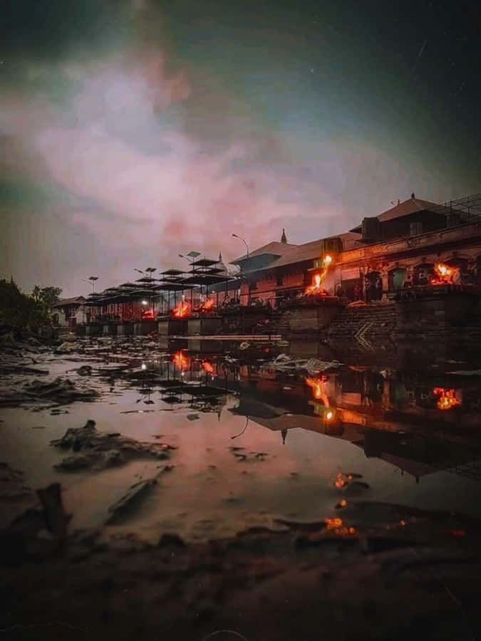 Kathmandu: Pashupatinath Aarati & Cremation Evening Tour - Arriving beside the Bagmati River