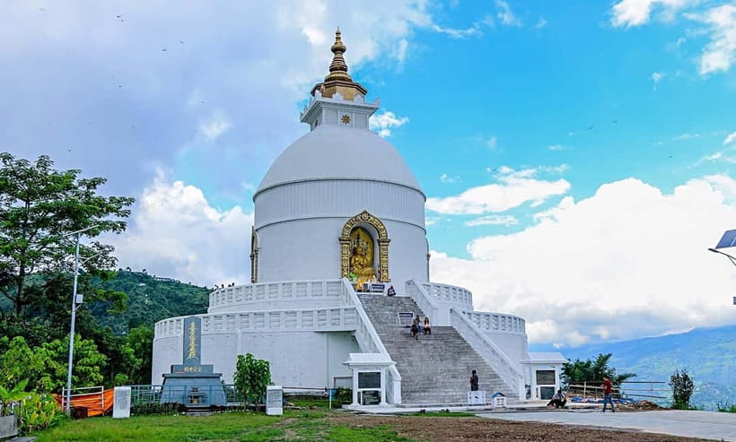Pokhara: City Sightseeing Group Budget Bus Tour - Pumdikot Shiva Statue and the first hilltop views