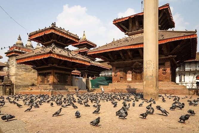 Private Tour of 4 UNESCO Heritage Sites in Kathmandu by Car - Swayambhunath: the hilltop stupa and Monkey Temple
