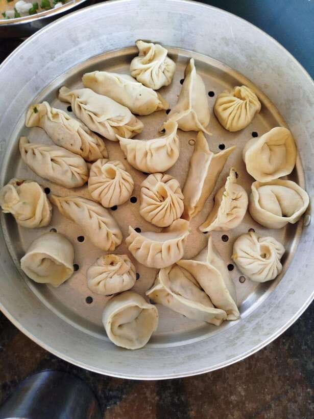 Traditional Momo Making Class - Starting with masala chai and local kitchen guidance